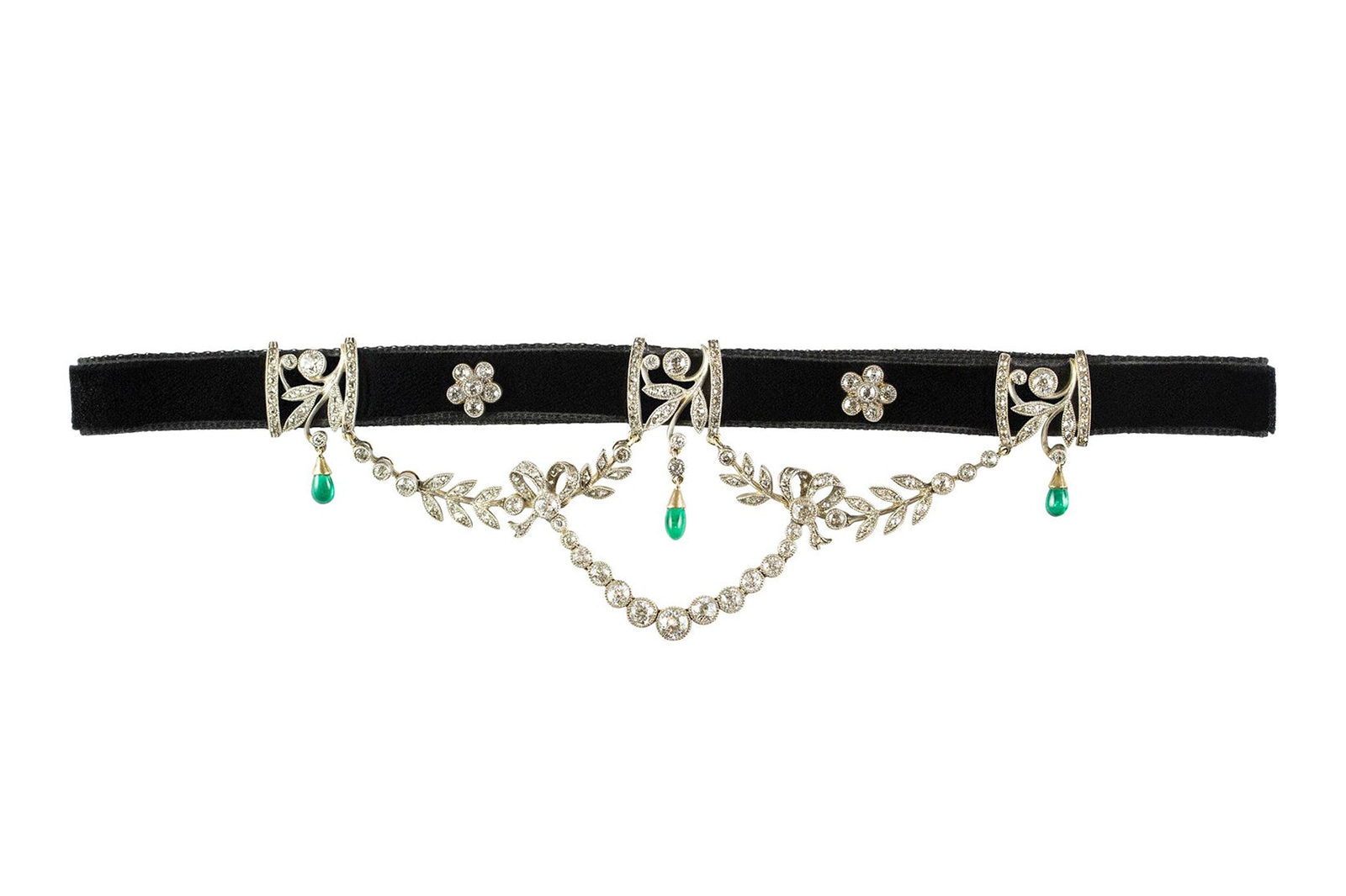 An antique Edwardian diamond and emerald festoon necklace available at Bentley & Skinner