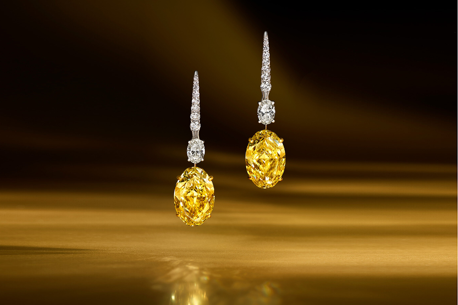  Graff oval-shaped yellow diamond earrings with white diamonds