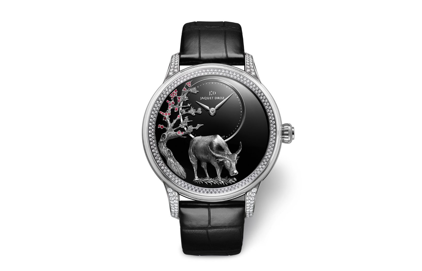  Jaquet Droz Petite Heure Minute Buffalo watch is set with small rubies to add colour to an engraved plum tree