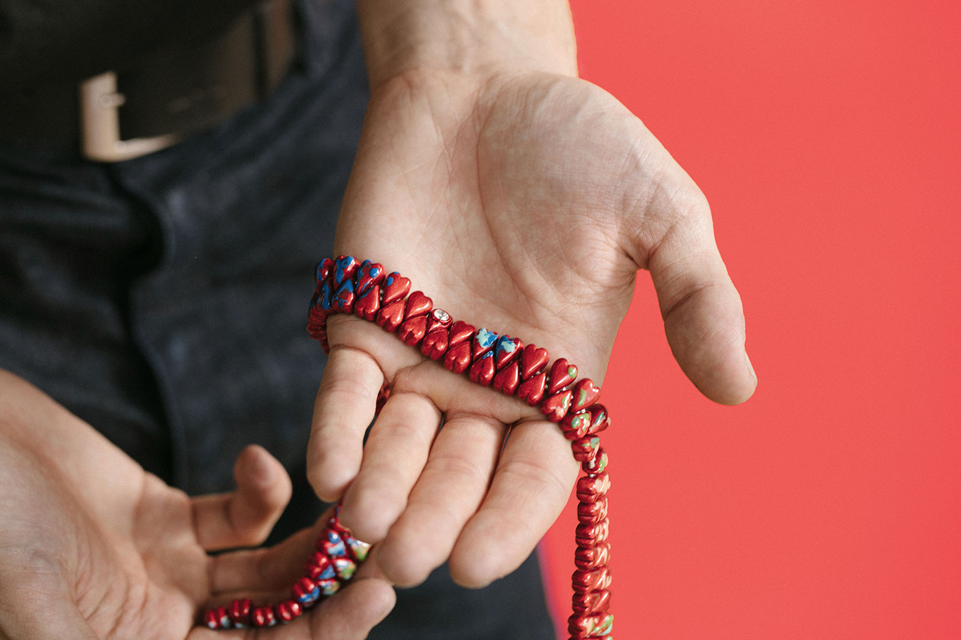 Louis Tamlyn presents his red enamel and diamond necklace, created for the ReSet Forever Love collection