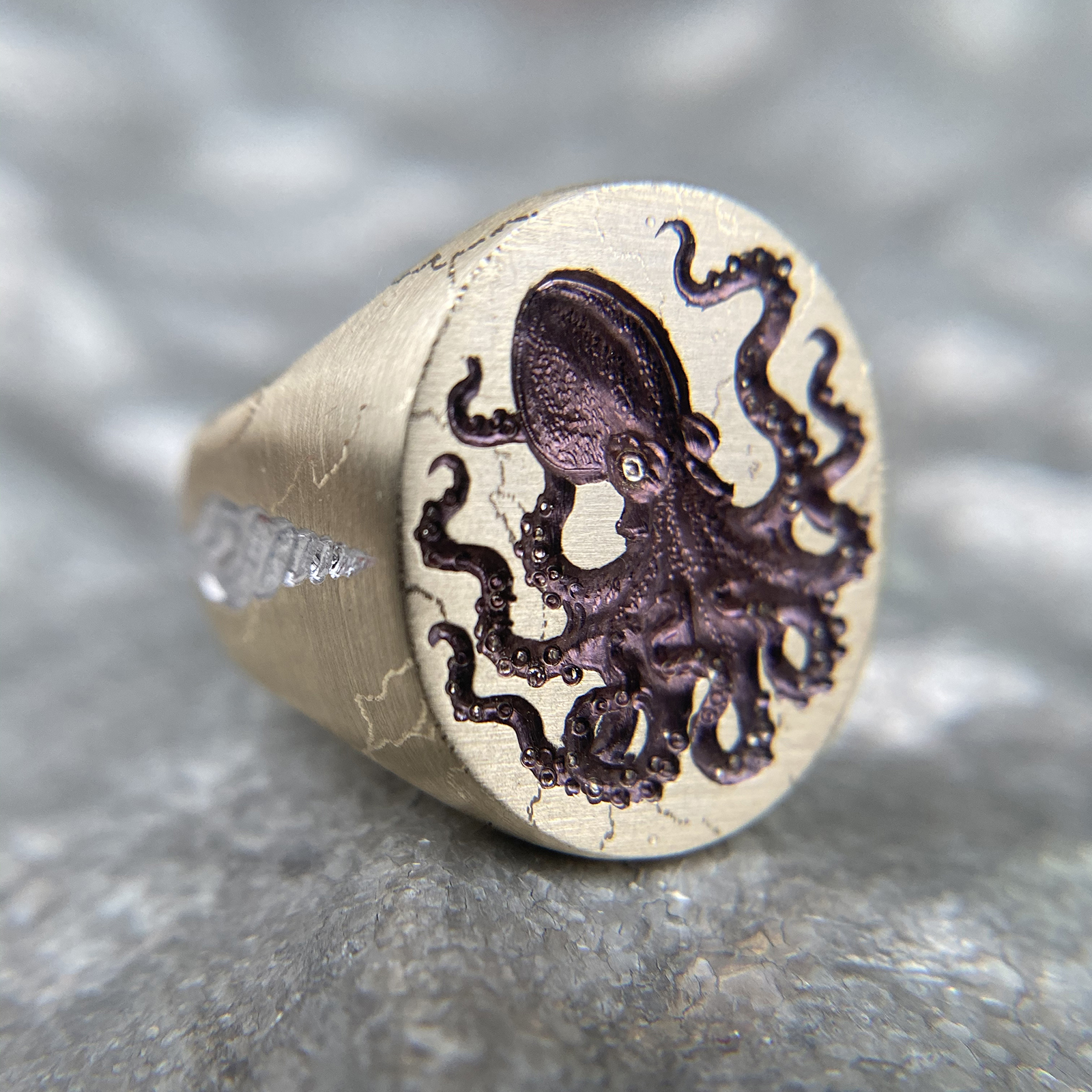  Castro Smith Octopus ring in yellow gold with purple rhodium engravings 
