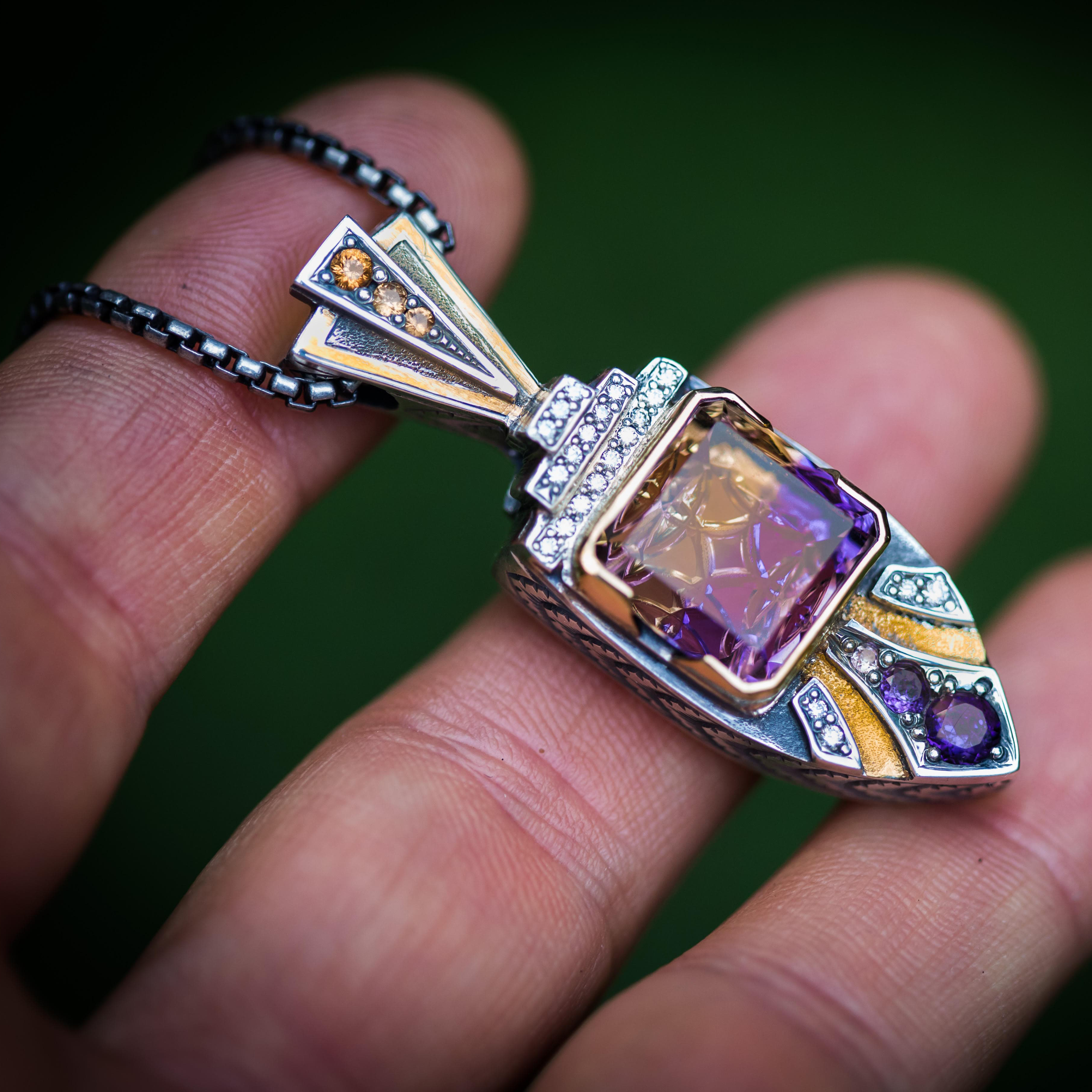  Hand-engraved pendant with a fantasy-cut ametrine by Nick Noyes of Noyes Designs 
