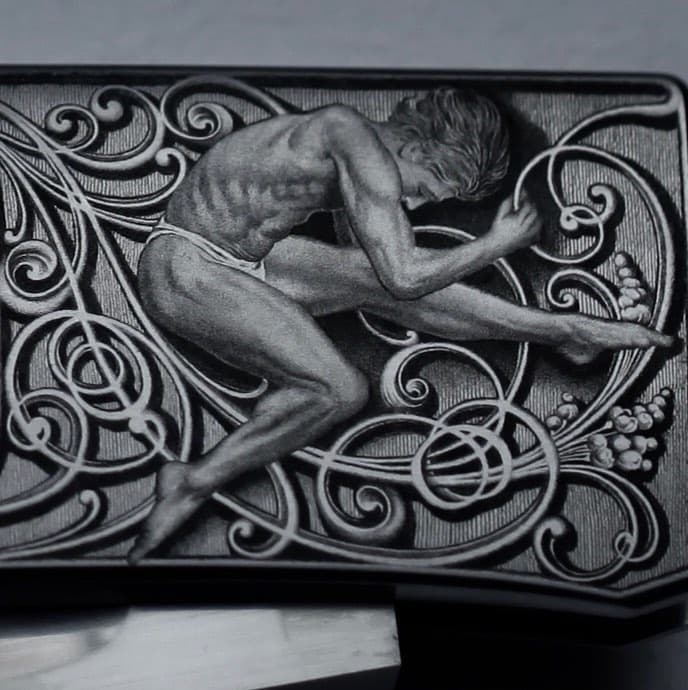  Engraving on a knife hilt by Firmo Fracassi