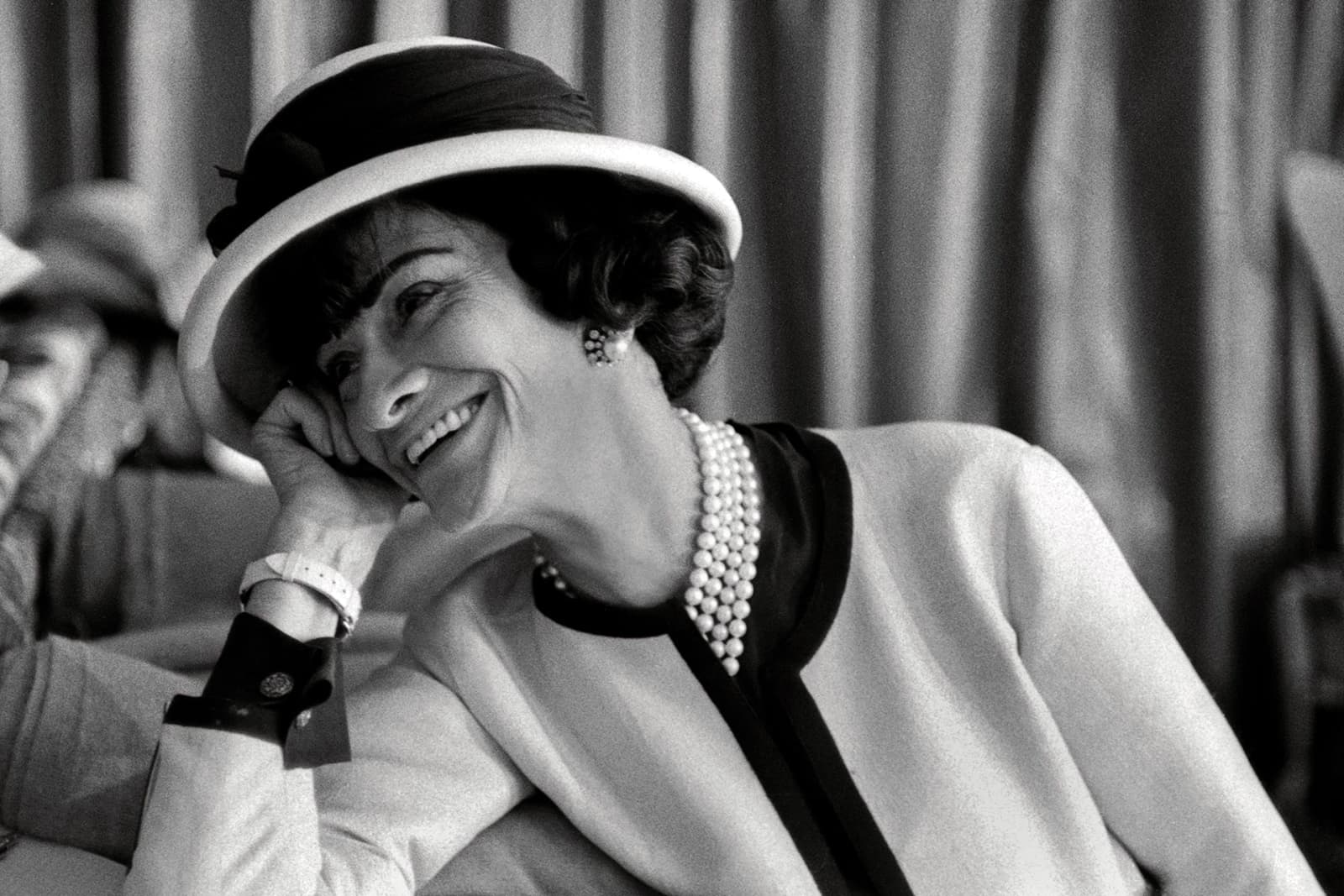  Gabrielle 'Coco' Chanel wearing her signature pearl jewellery pieces 