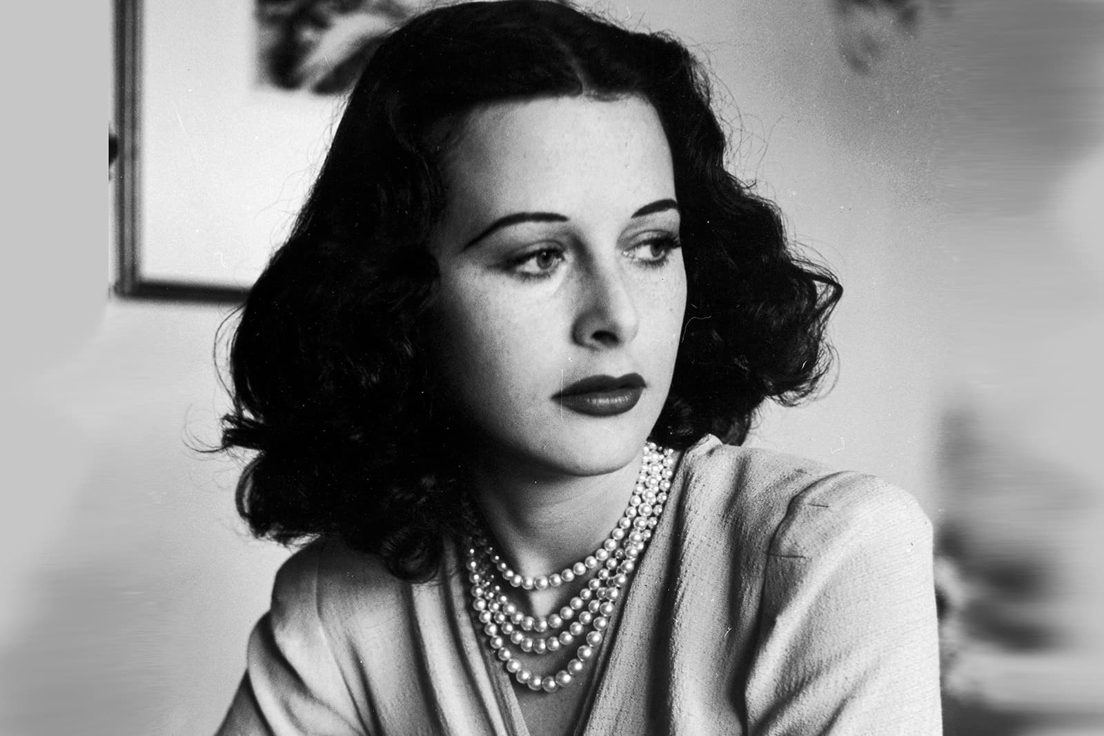  Actress and inventor, Heddy Lamarr, wearing a classic layered pearl necklace