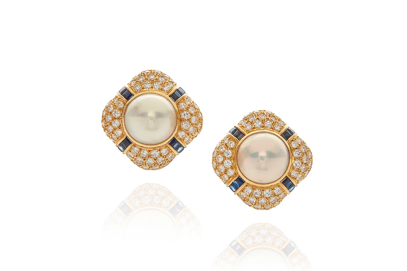  Mabe white pearl, blue pave diamond and 18k yellow gold earrings, auctioned by Bonhams
