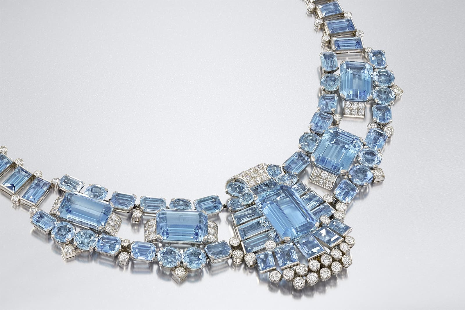 An aquamarine and diamond necklace by Cartier, circa 1940, sold by Bonhams