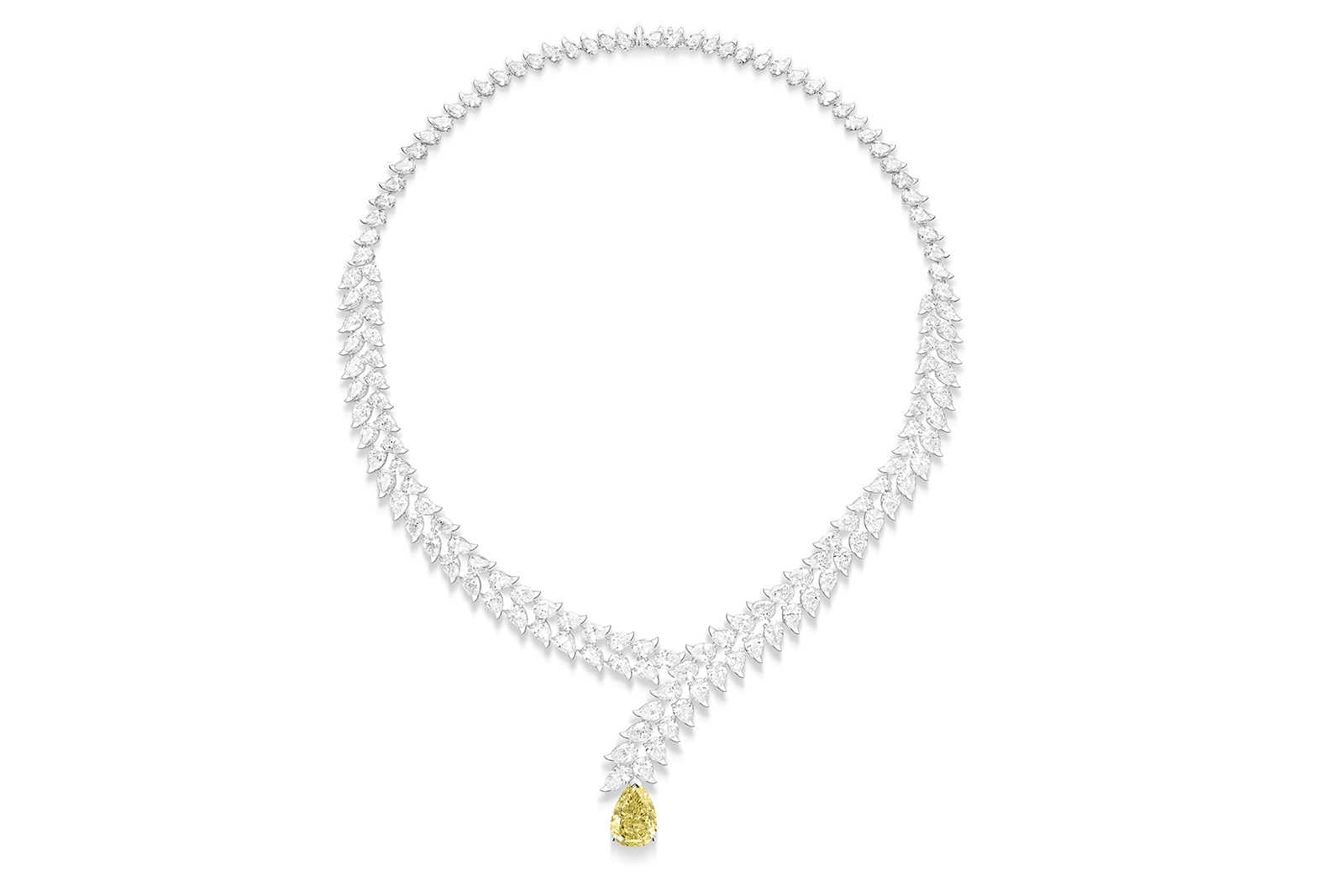  The transformable Piaget Diamond Heliconia necklace with a 6.46 carat pear-shaped fancy vivid yellow diamond that can be worn in four different ways, even as a ring, from the Wings of Light High Jewellery Collection