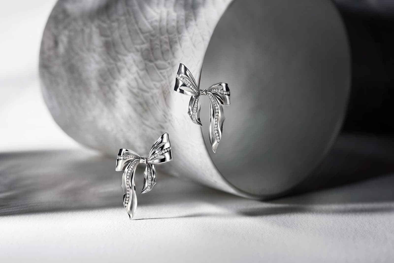 Take a Bow earrings by Sabine Roemer in white gold earrings, set with 0.51cts of white diamonds