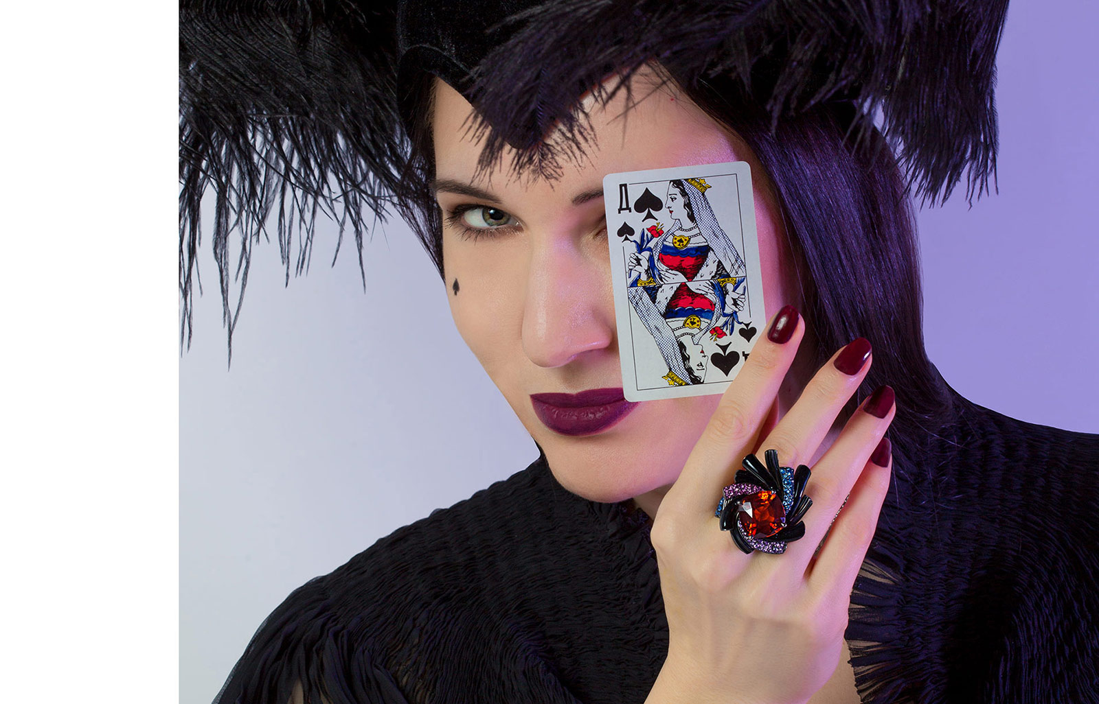 This Lorenz Baumer Nébuleuse Black Magic ring from the Black Magic collection with a 16.11 carat spessartite garnet, blue, pink and purple sapphires in white gold with black rhodium is the ideal accompaniment to a Lita Weizman dress and a headpiece by Maison Krasnova