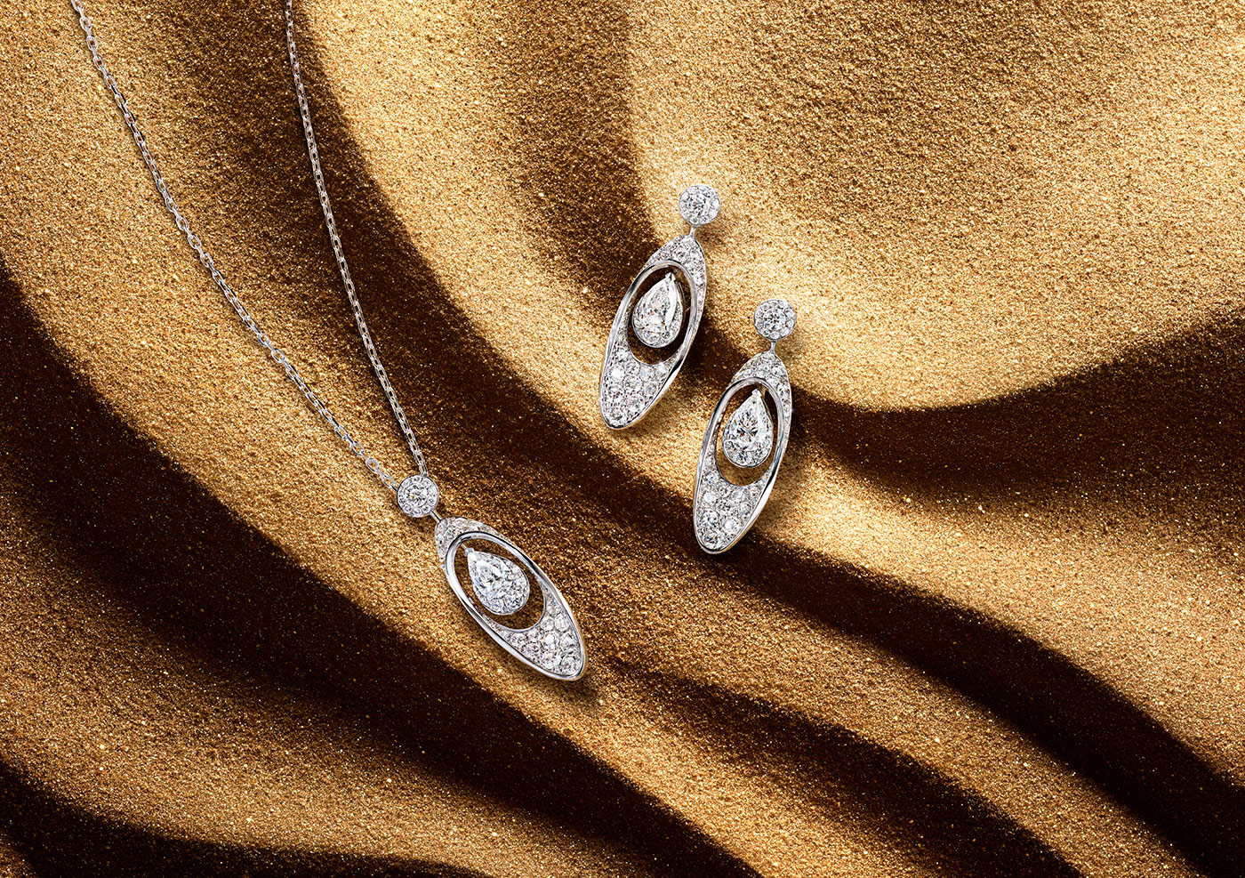  A matching pendant and earrings with a combined diamond weight of 5 carats from the Graff Tribal High Jewellery Collection