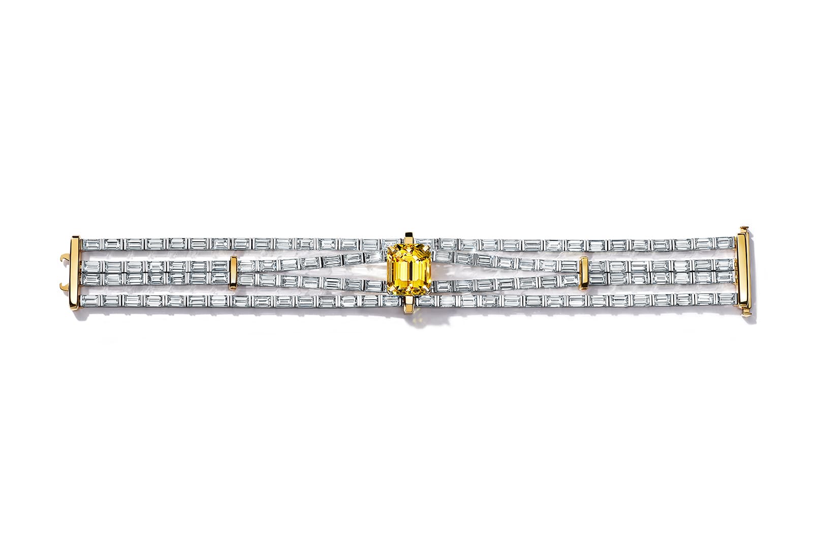  Tiffany & Co. Sky bracelet from the Colors of Nature High Jewellery Collection, crafted in platinum and 18k yellow gold with an emerald-cut unenhanced yellow sapphire of over 11 carats and more than 26 carats of baguette diamonds