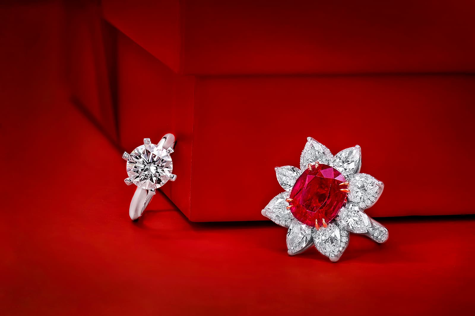  Astteria solitaire ring with a 3.17 carat G VS1 diamond and a 6.18 carat ruby ring with eight pear-shaped diamonds