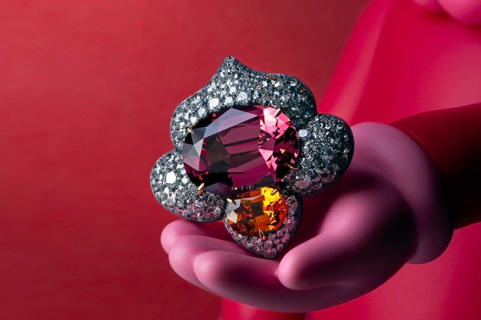  David Michael ring with a 15.56 carat spinel and a 3.01 carat spessartine garnet in oxidised silver and 18k gold