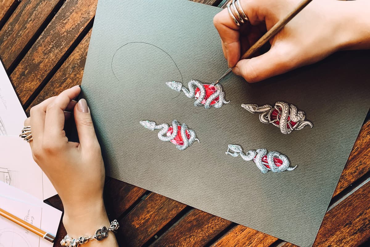  Gouache painting of a pair of snake-inspired earrings with diamonds and rubellites by Nina and Mila Pikova