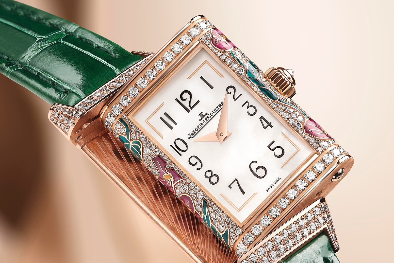  The Jaeger LeCoultre Reverso One Precious Flowers watch has a refined dial with Art Deco-inspired numerals and white mother of pearl 
