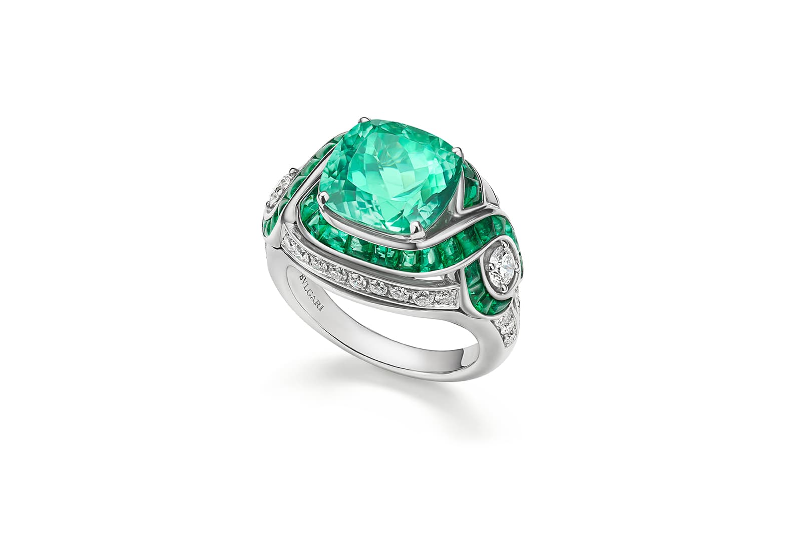  Bulgari Colour Journeys Paraiba Tourmaline High Jewellery ring in white gold with 1 cushion-cut Paraiba tourmaline (Mozambique – 5.60 cts), 36 buff-top emeralds (1.17 cts), 2 round brilliant-cut diamonds and pavé-set diamonds (D-F IF-VVS 0.74 cts)
