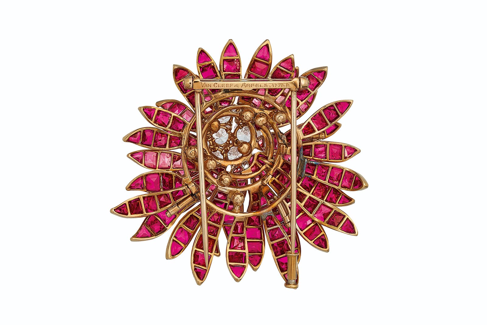  The reverse side of an exceptional Van Cleef & Arpels ruby and diamond brooch, sold by Christie's