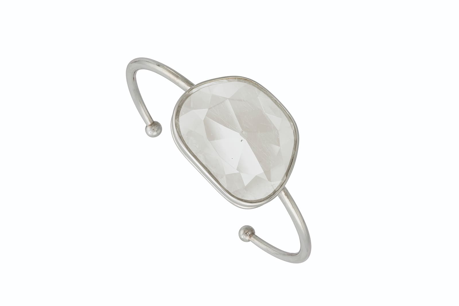  A torque bangle with a 10.15 carat diamond set in platinum, sold by Christie's