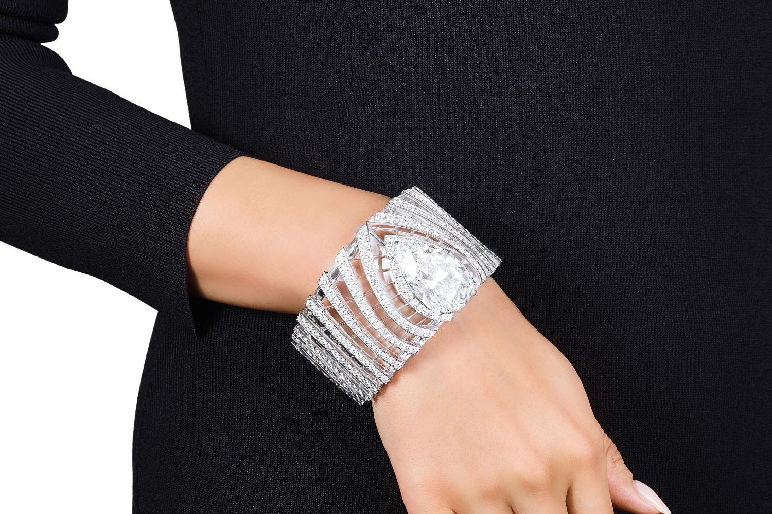 L’Odyssée de Cartier Parcours d’un Style diamond and rock crystal bangle with a 63.66 carat, D-colour internally flawless diamond, sold at Sotheby's