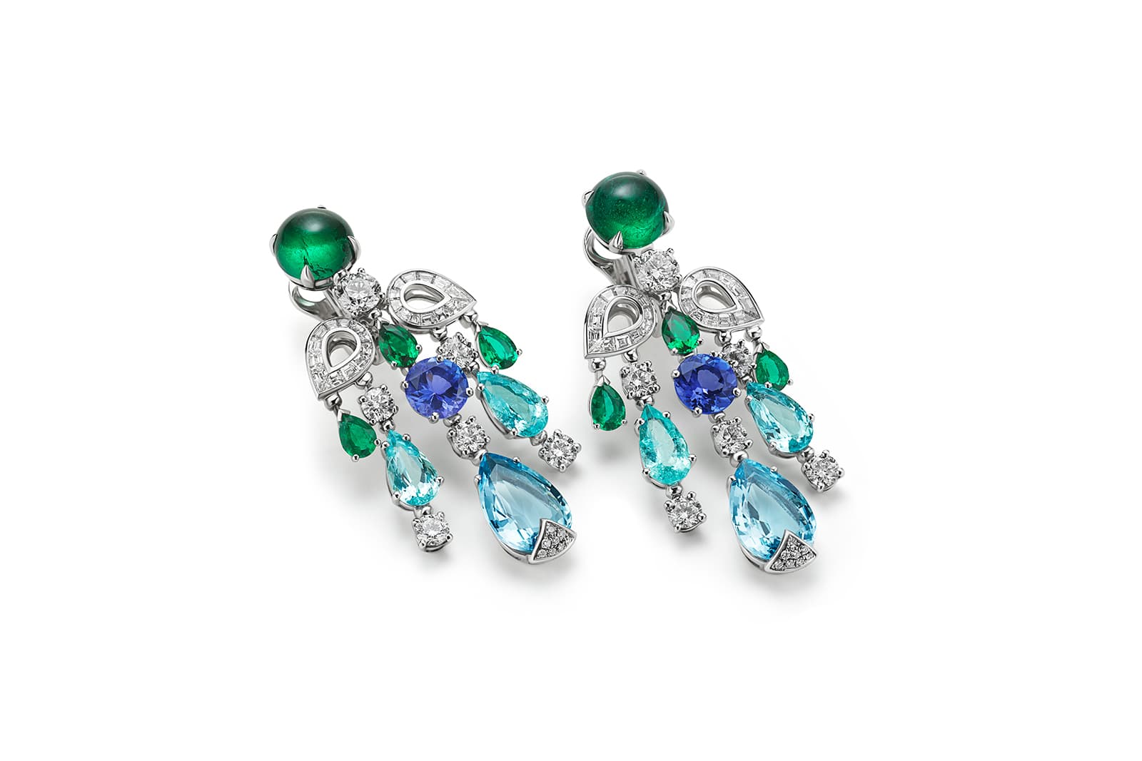 This Bulgari Colour Journeys Paraiba Tourmaline High Jewellery earrings in white gold with 2 cabochon-cut emeralds (Zambia – 3.33 ct – 3.15 ct), 2 pear aquamarines (6.50 ct), 4 Paraiba tourmalines (4.58 ct), 2 round tanzanites (2.58 ct), 6 pear emeralds (1.84 ct), 48 fancy-step cut diamonds (F-G VVS-VS 1.30 ct), 12 round brilliant-cut diamonds and pavé-set diamonds (D-F IF-VVS 3.10 ct)