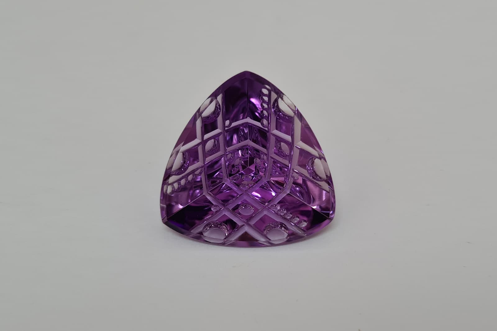  Fredh Jhones learned to cut gemstones like this amethyst with his father-in-law