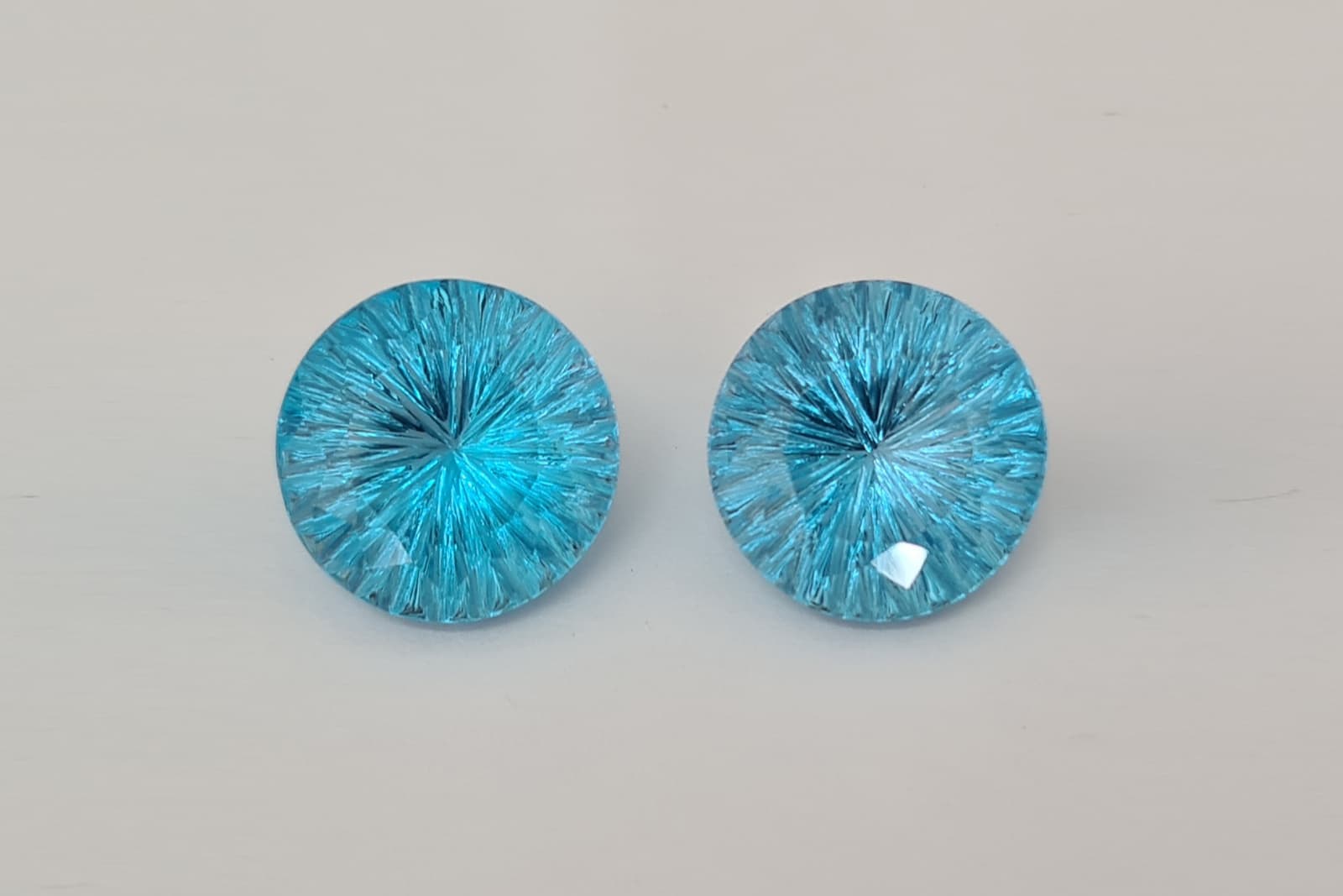  A matching pair of custom-cut blue gemstones by Fredh Jhones 