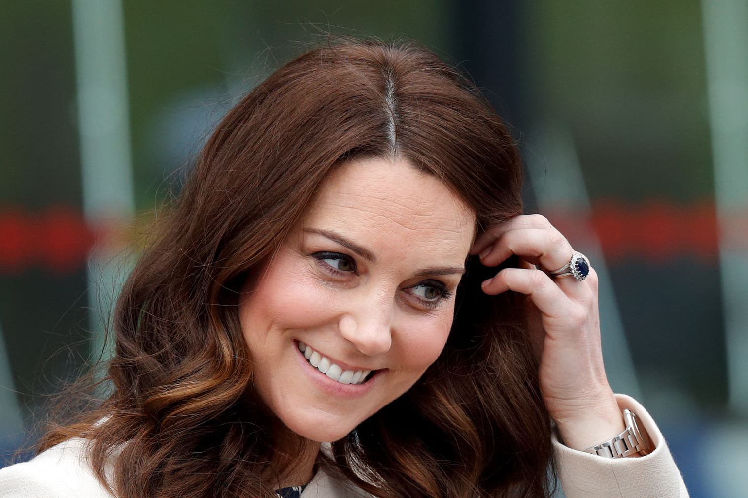 Catherine Middleton, the Duchess of Cambridge wearing the sapphire and diamond cluster engagement ring given to her by Prince William