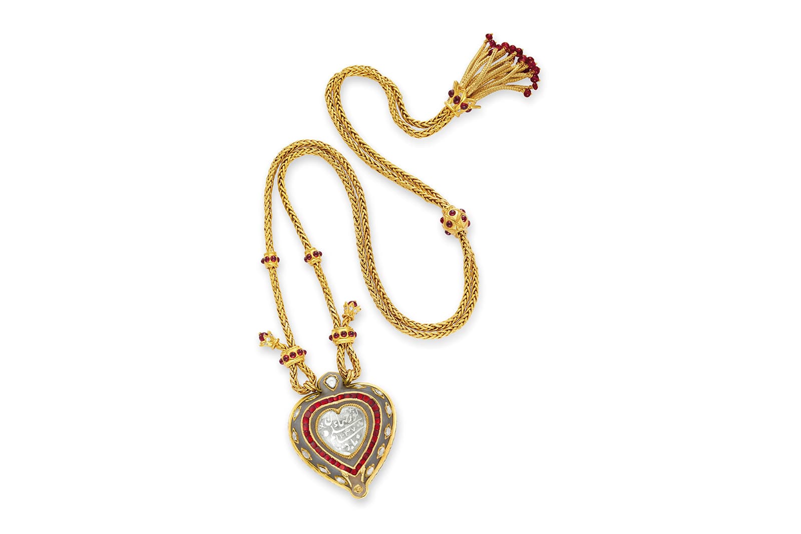   An Indian diamond and jade heart-shaped pendant necklace, set with rubies, once part of the high jewellery collection of Elizabeth Taylor 