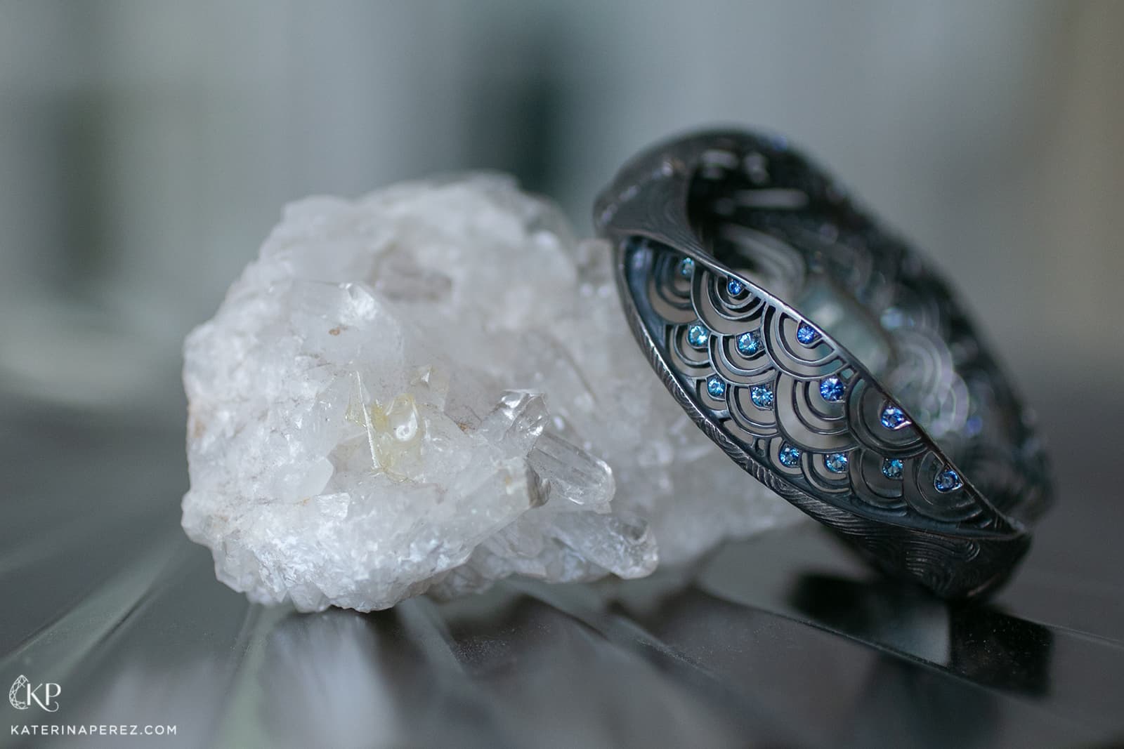  Every element of the Waves bracelet by Maison Alix Dumas has been thoughtfully considered and set with aquamarines and sapphries