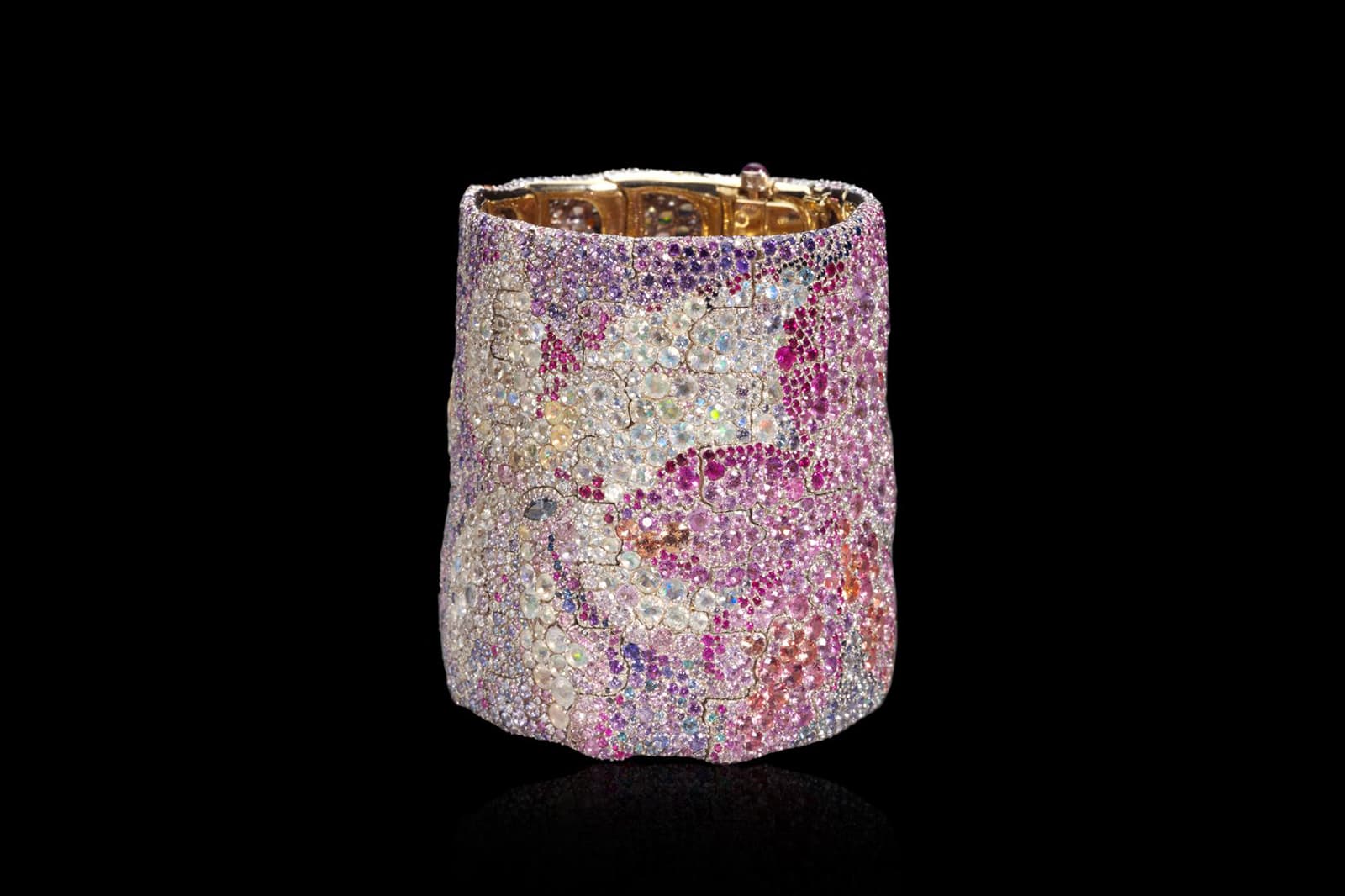 Les Nymphéas cuff bracelet by Frédéric Zaavy for Fabergé in platinum, silver, and yellow and white gold, with pavé-set rubies, aquamarines, amethysts, fire opals, moonstones, tsavorites, spinels, paraiba tourmaline and sapphires, in addition to 11.93 carats of fancy colour diamonds