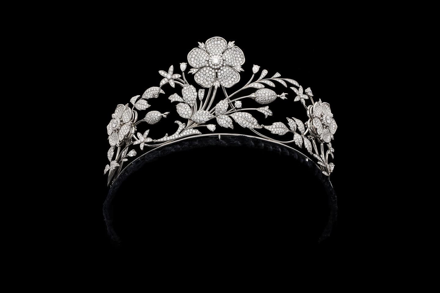 An en tremblant diamond and platinum floral tiara made by London jewellery manufacturing firm E. Wolfe & Co., with a design dating back to 1904