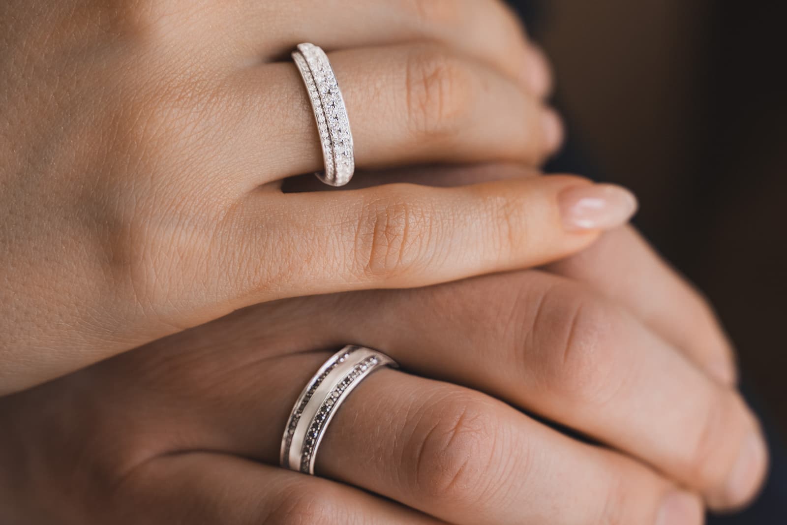  A duo of diamond-set wedding bands for him and her by Miracle Jewelry 
