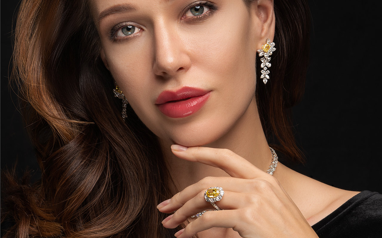 Gemma Fine Jewellery engagement ring and a pair of diamond earrings 