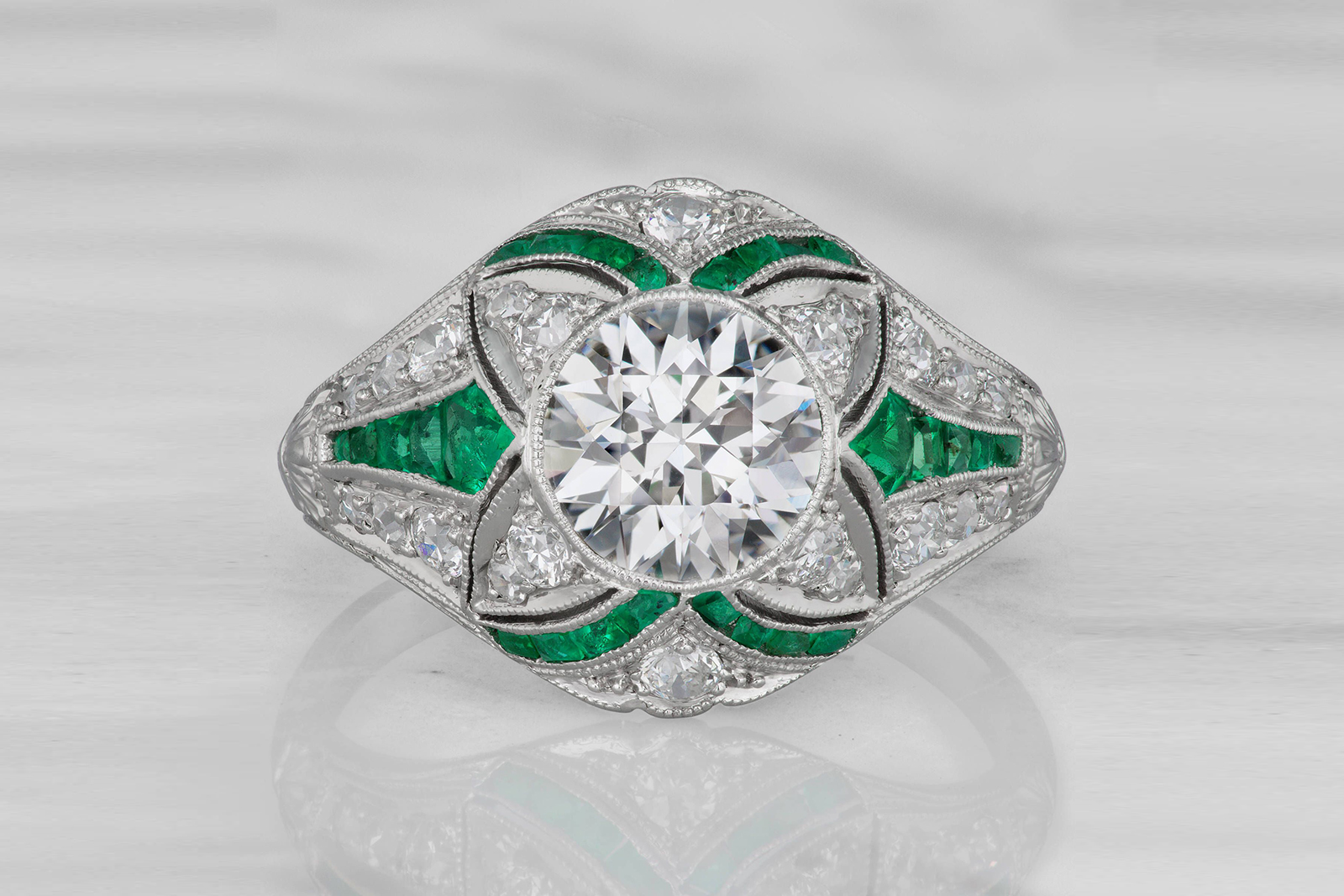  Victor Barboné  Art Deco-style emerald and diamond engagement ring 
