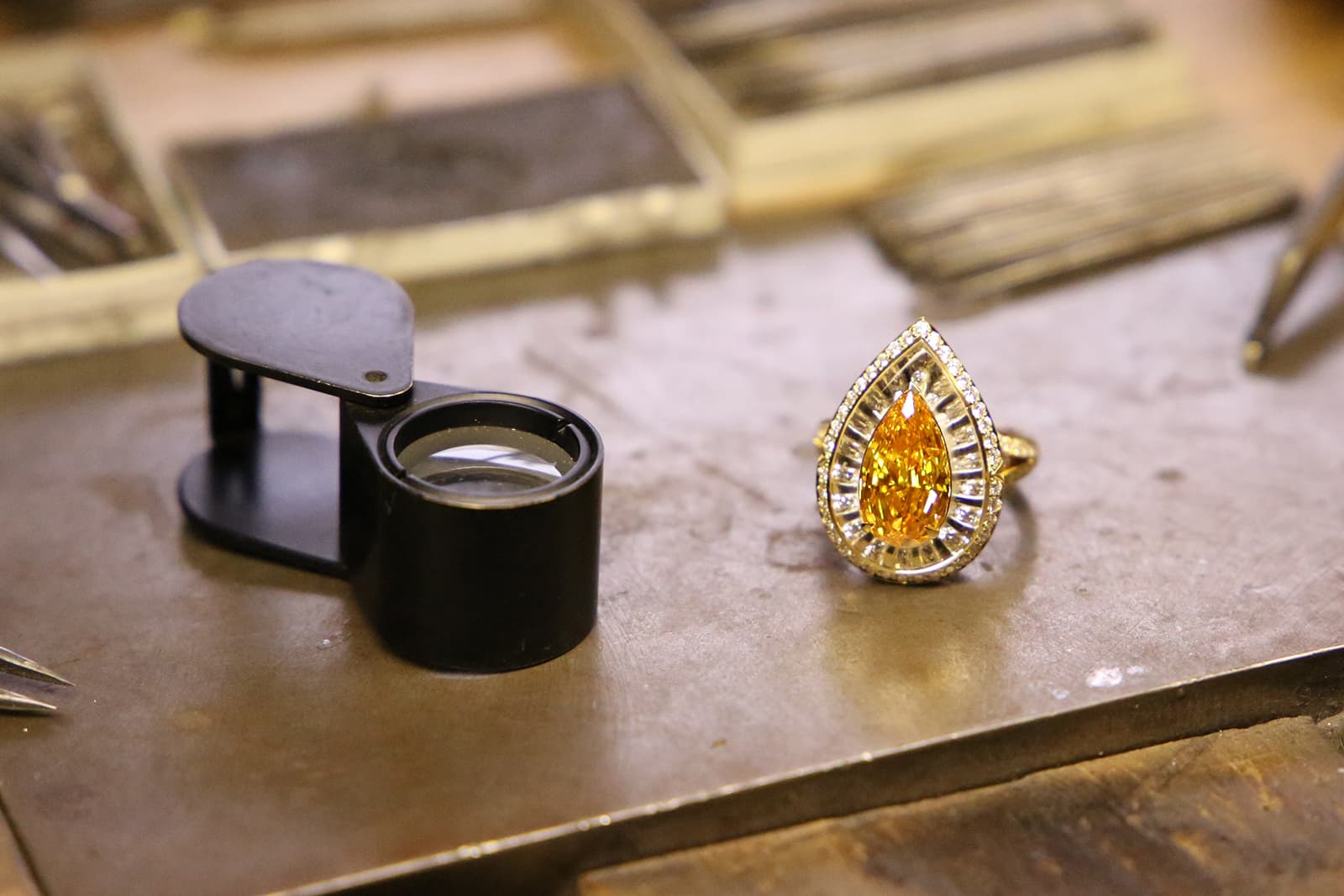   Boodles Havana ring from the ‘Around the World in 16 Days’ High Jewellery collection ready for examination at the bench 