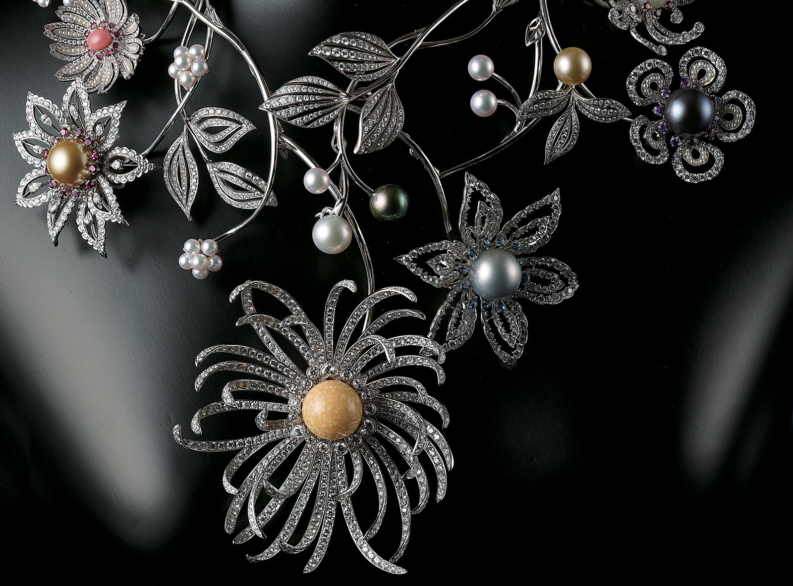 The Mikimoto Dreams & Pearls crown contains rare conch and melo pearls in 12 uniquely designed floral arrangements