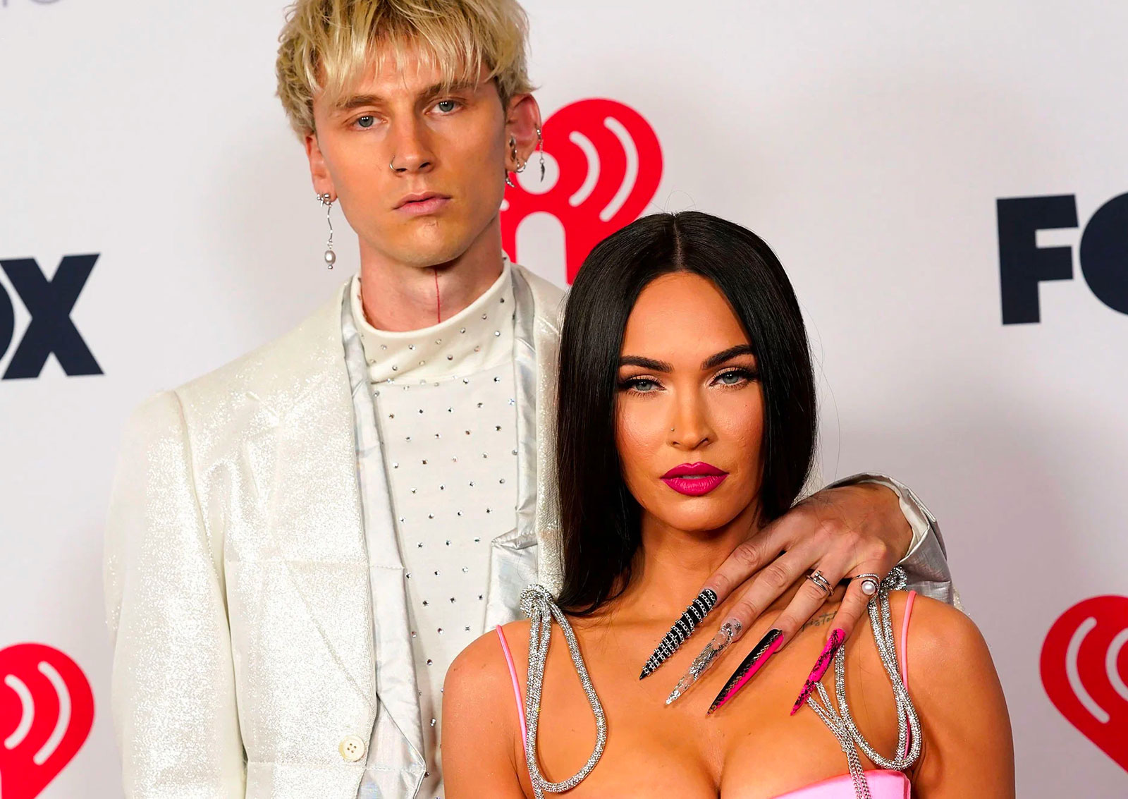 Machine Gun Kelly wears an unusual mix of jewellery alongside Megan Fox at the iHeart Music Awards 2021