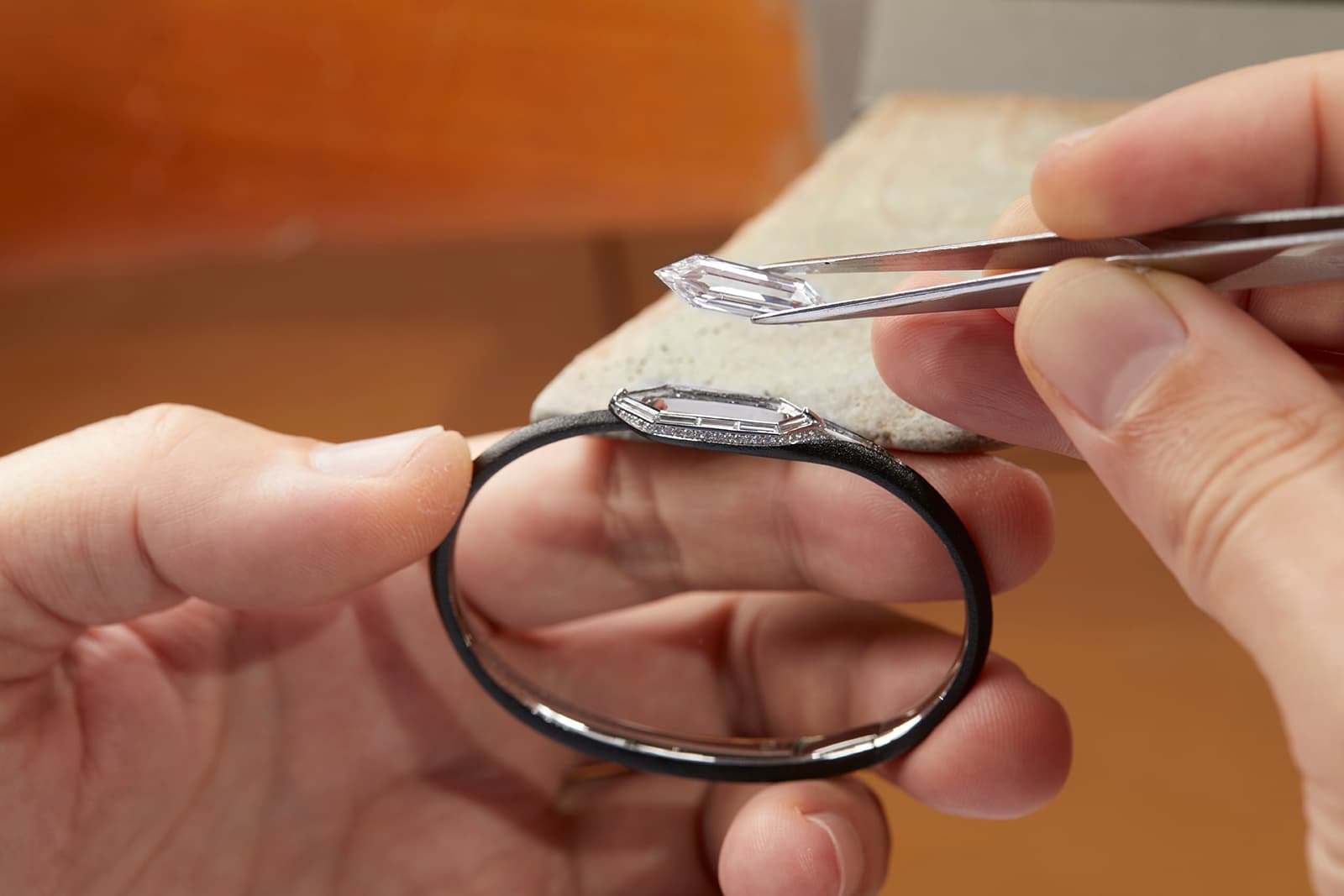  The FORMS MUSE shield-shaped diamond bangle contains a 3.09 carat diamond and a further 0.64 carats of smaller stones with a carbon black PVD coating 