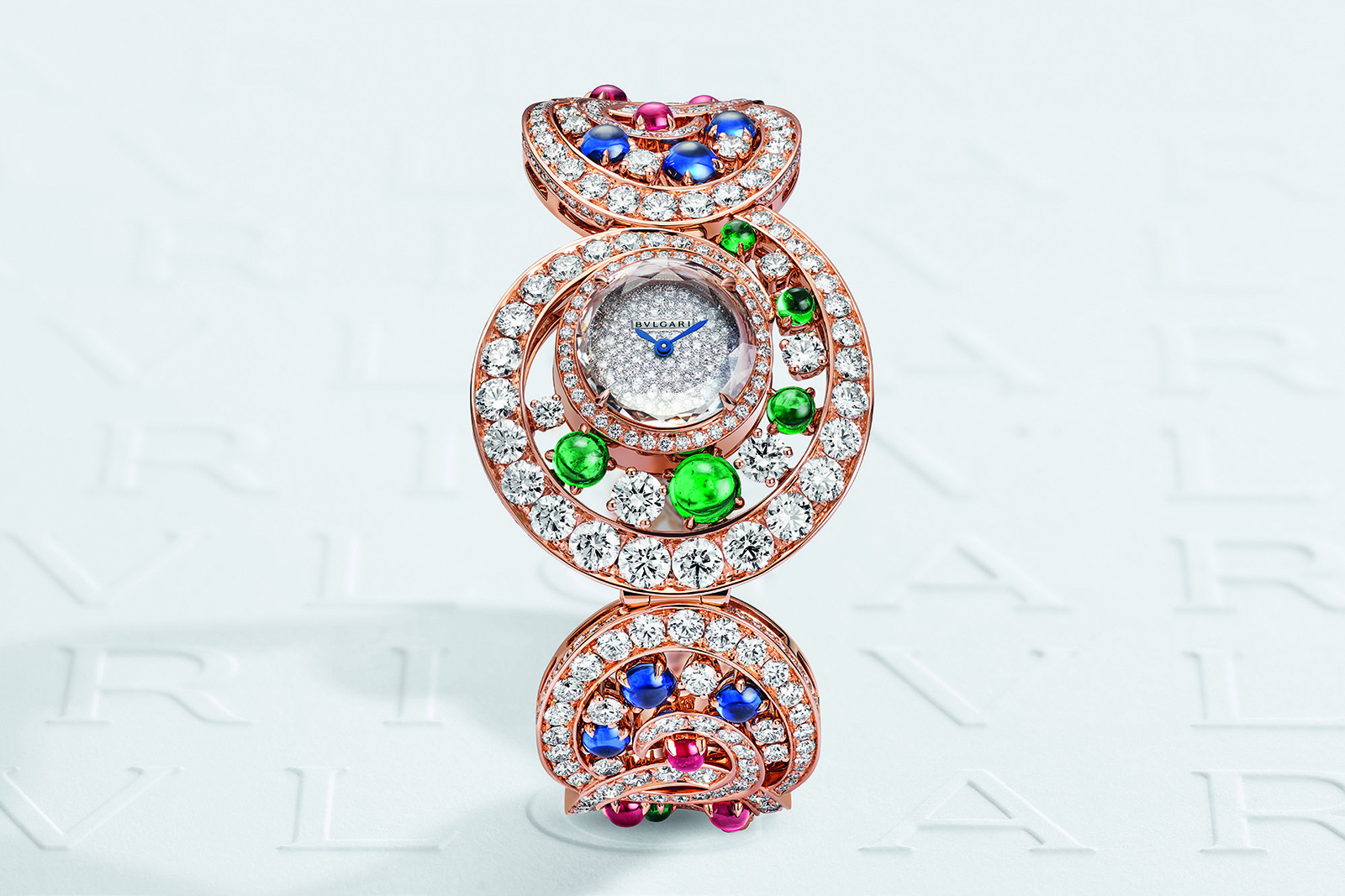 Bulgari Baroque Spiral High Jewellery secret watch from the MAGNIFICA collection with cabochons of sapphires, emeralds and rubies 