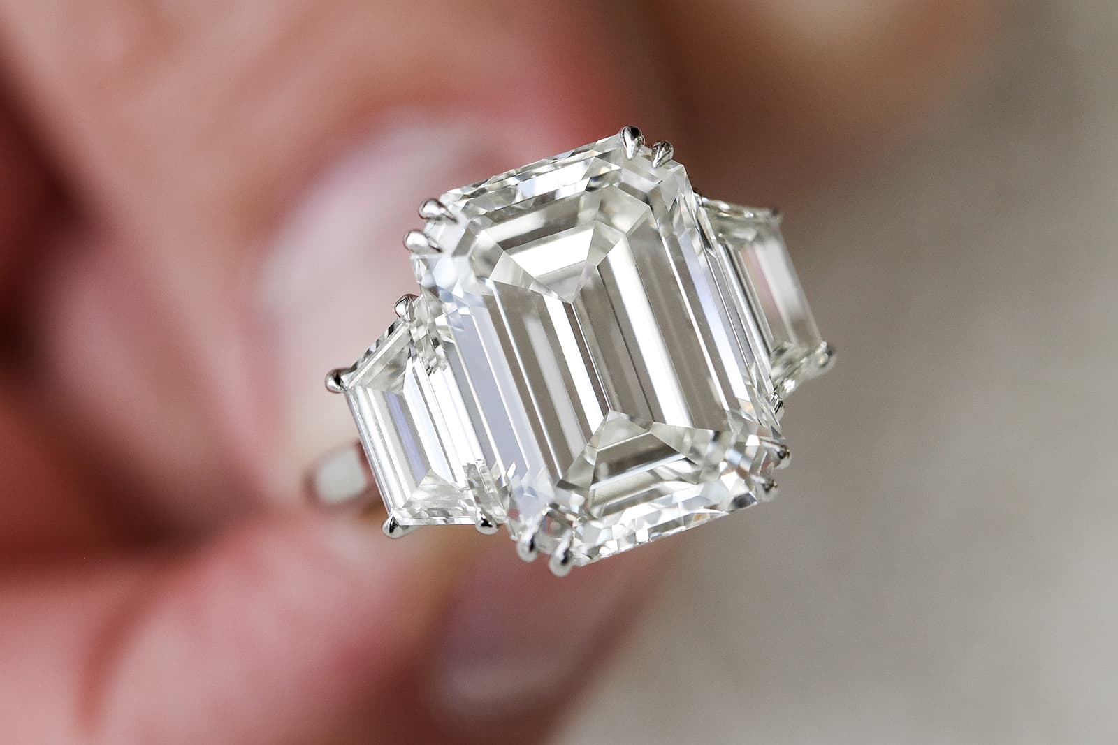  A three-stone emerald-cut diamond engagement ring custom-made by IceRock Diamonds