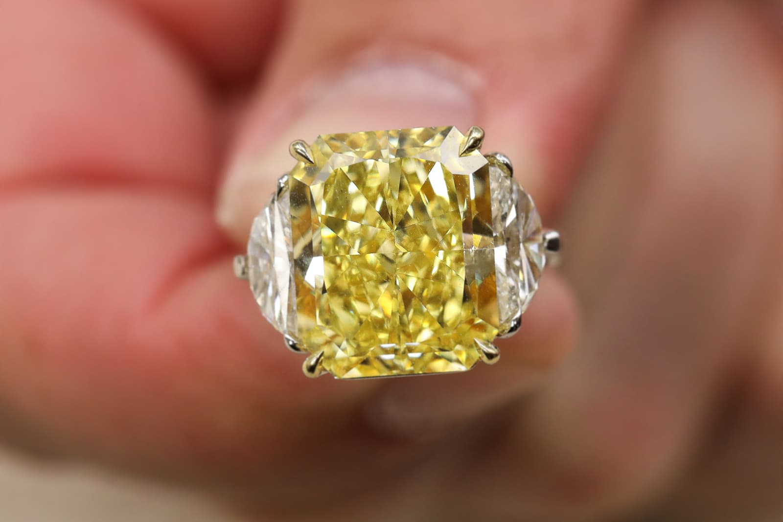  IceRock Diamonds fancy yellow diamond ring with two colourless diamond side stones 