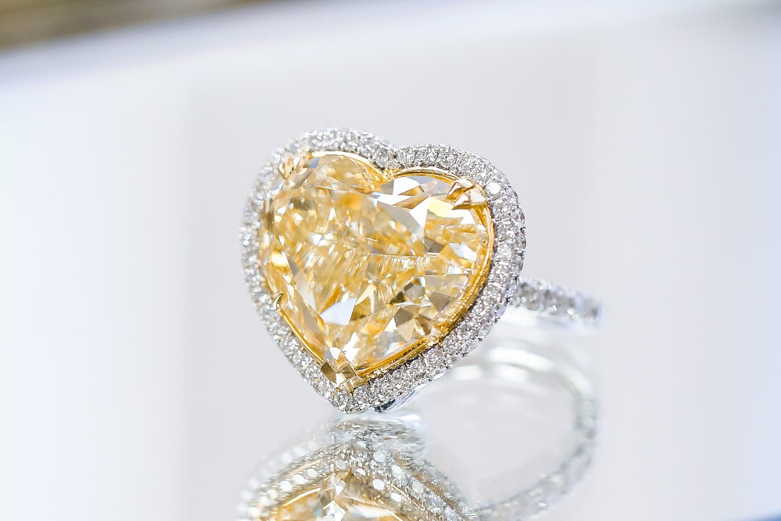 IceRock Diamonds heart-shaped yellow diamond ring with a colourless diamond halo 