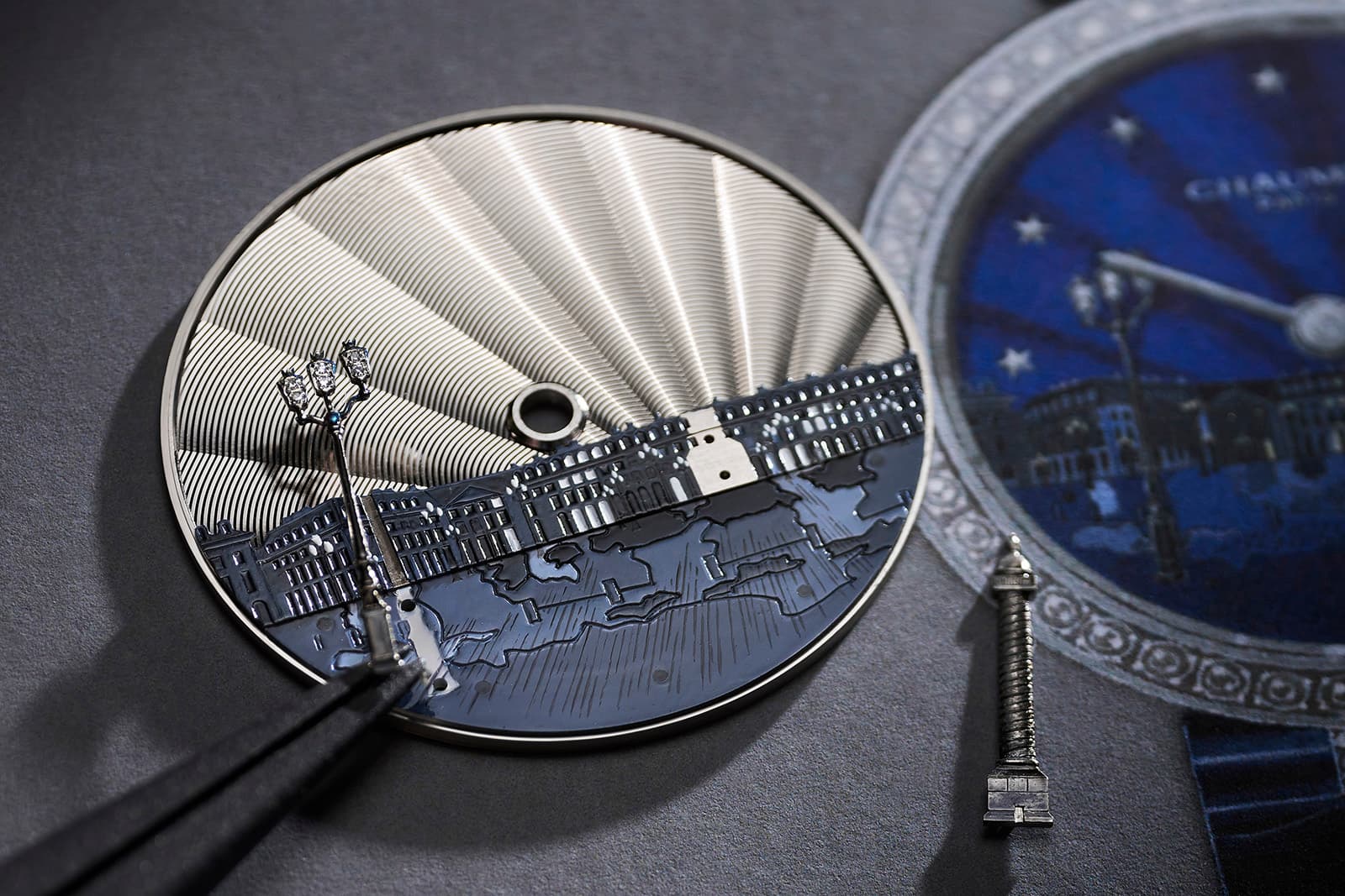  The Chaumet Infiniment 12 - Rêverie Nocturne draws on numerous artistic techniques to create a miniature Place Vendôme scene 