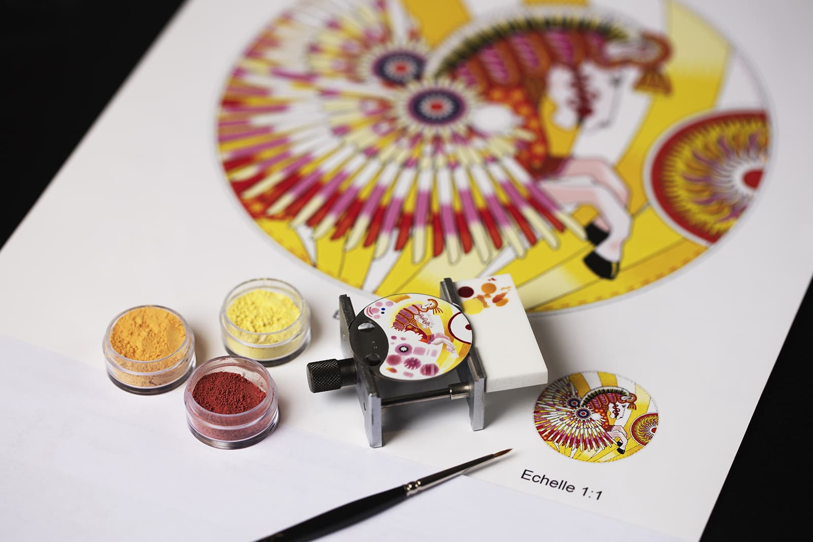  The yellow Slim d’Hermès La Source de Pégase watch has an enamel and straw marquetry dial