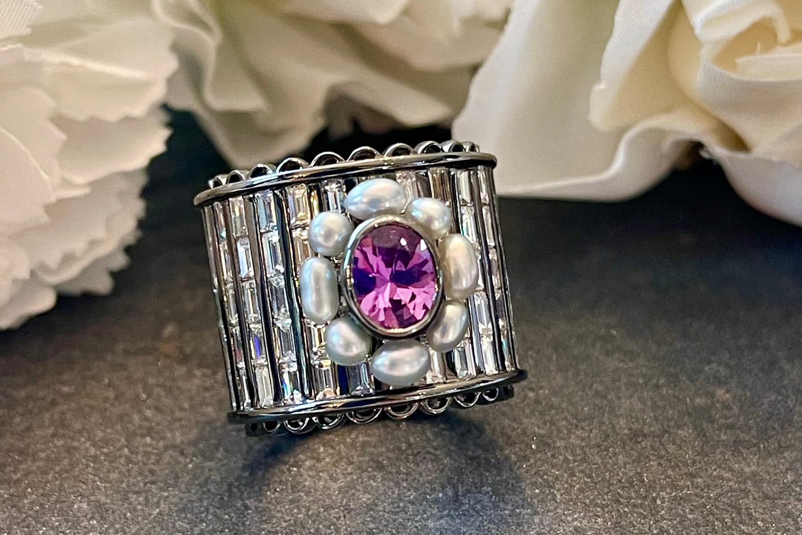  Moksh bracelet design with a central coloured gemstone, baroque pearls and diamonds