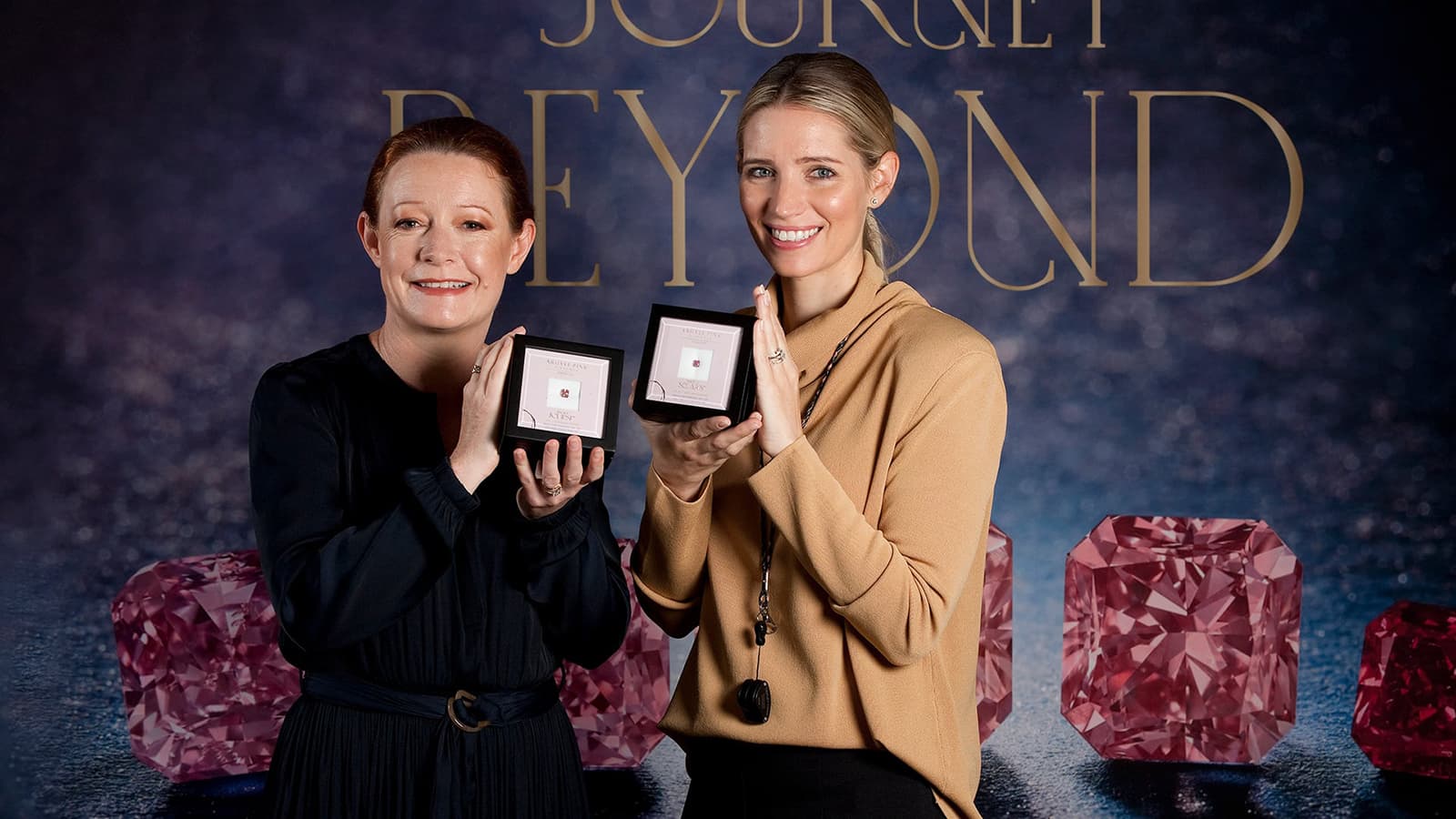 Chief Executive of Rio Tinto Minerals, Sinead Kaufman, and Sales and Business Development Manager of Rio Tinto Diamonds, Michelle Sherring, celebrate lots in the final Argyle Pink Diamonds tender