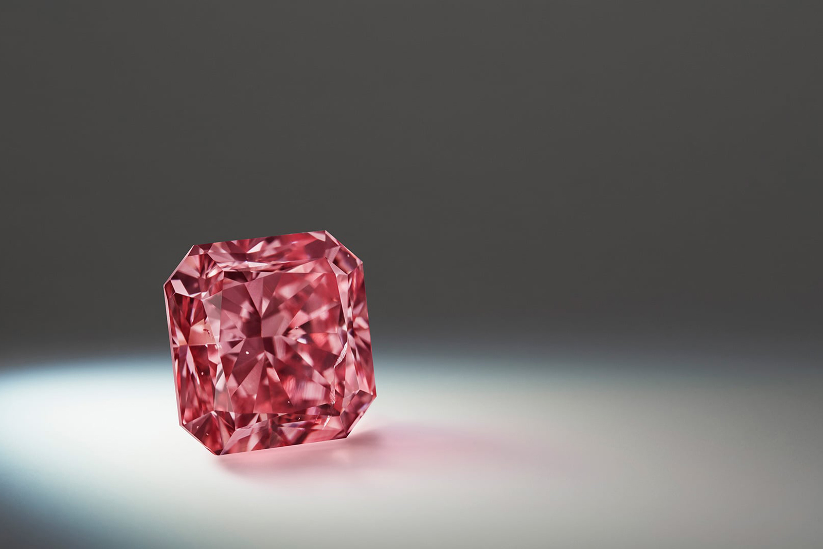  The Argyle Lumiere, a 2.03 carat square radiant-shaped  fancy deep pink diamond