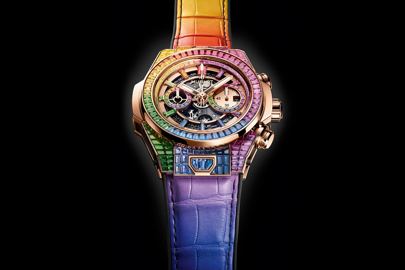  The Hublot Big Bang Unico High Jewellery Rainbow watch has an 18k rose gold case and multi-coloured aligator leather strap