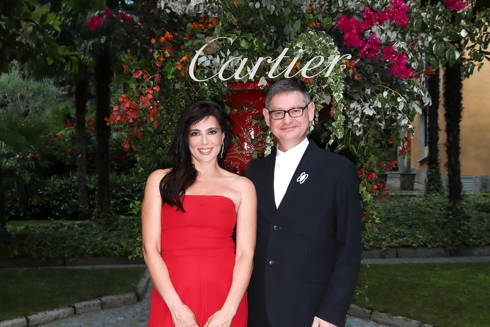  Nadine Labaki and Cyrille Vigneron, President and CEO of Cartier International, at the the Sixième Sens par Cartier High Jewellery Collection launch event in Lake Como, Italy 